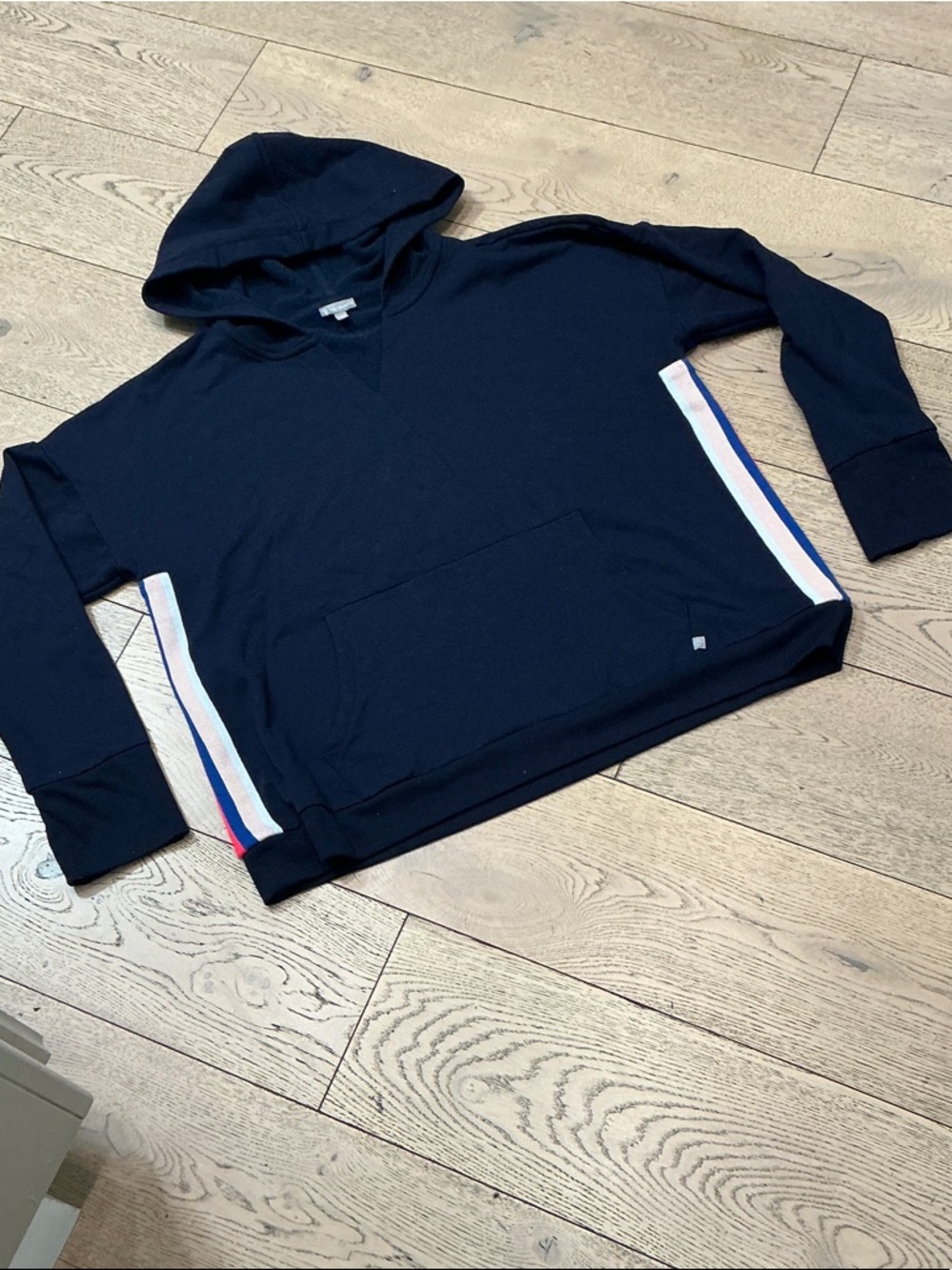Woman’s Talbots navy hoodie. Size XL. Pink/blue/cream stripe on sides. Pocket.